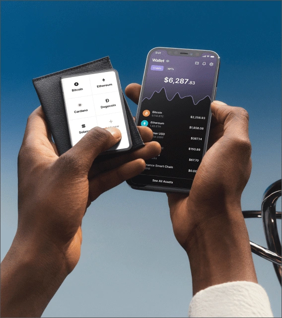 Hands holding Ledger signer and smartphone displaying Ledger Wallet financial dashboard